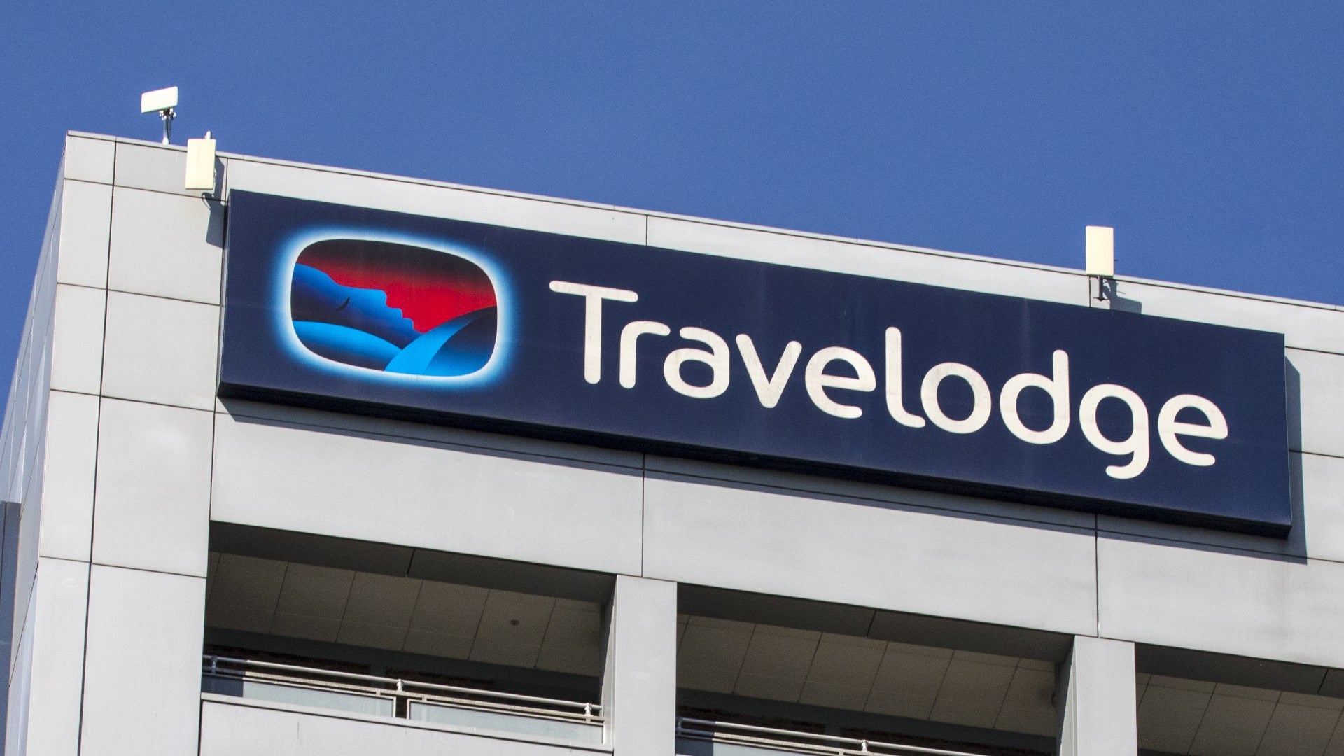 Travelodge Sign Store by